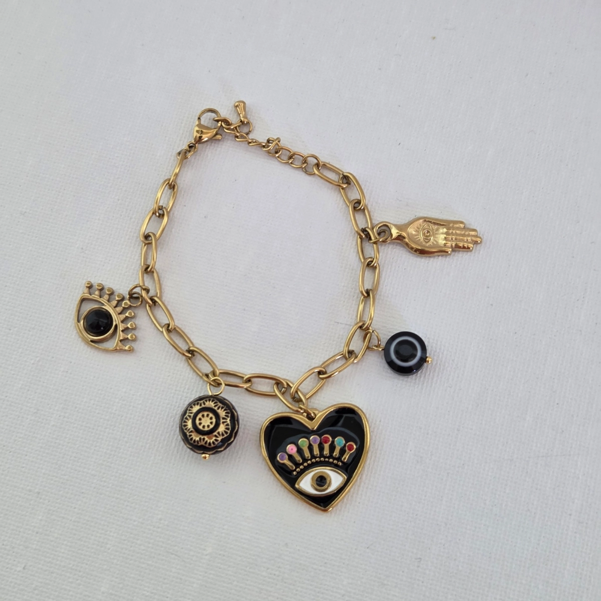 Bracelet acier inoxydable doré à charms œil protecteur noir style bohème chic femme