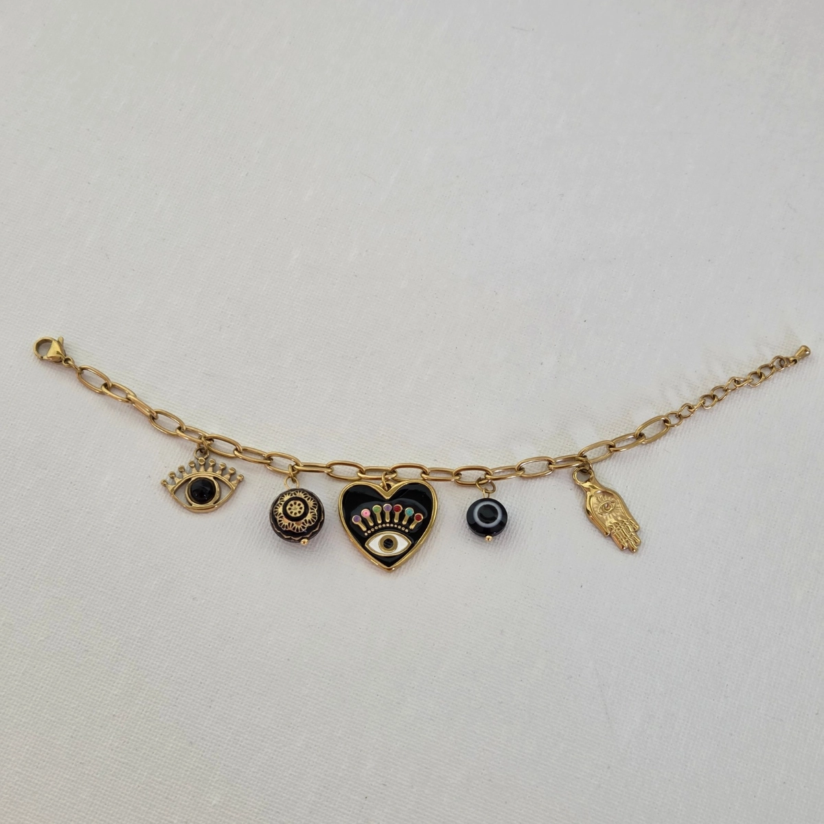 Bracelet acier inoxydable doré à charm œil protecteur noir style bohème chic femmes